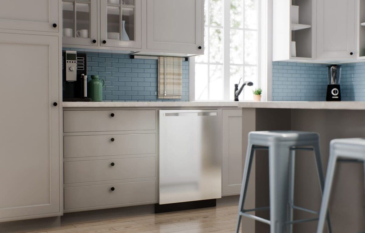 A modern shaker style kitchen features an array of kitchen cabinet choices, with sleek white cabinets, a stainless steel dishwasher, and a blue tiled backsplash. A coffee maker sits on the counter by the window, while two metal stools invite you to the center island.